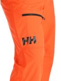 Thumbnail Helly Hansen, Sogn Cargo ski pants men Cherry Tomato orange 